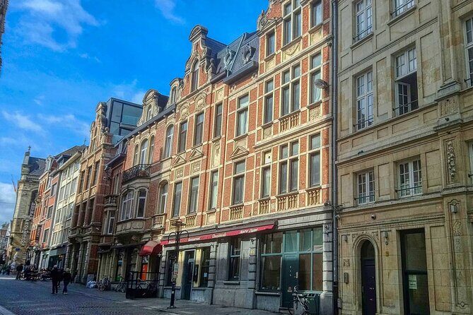 600 Years of History and Heritage: A Self-Guided Walking Tour of Leuven - Ladeuzeplein, the Beetle Totem, and a Building With Only 100 Years of Age
