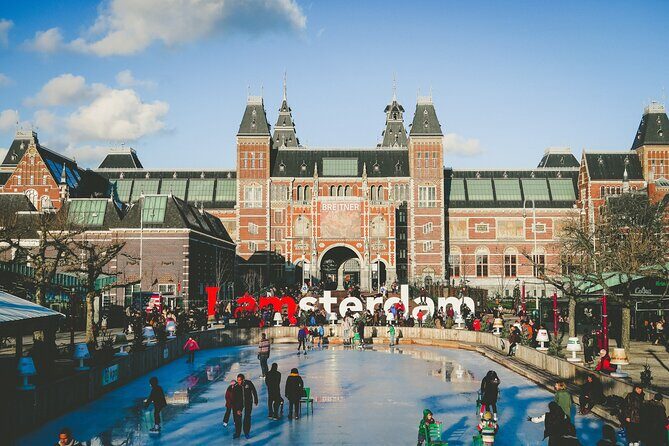 Amsterdam Day Trip from Brussels With Cheese, Clogs and Windmills - Dam Square and the Royal Palace area: what to look for (besides the crowds)