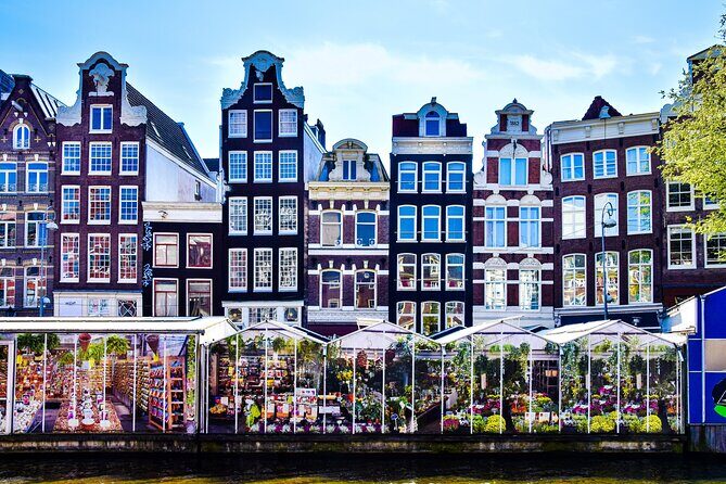 Amsterdam Day Trip from Brussels With Cheese, Clogs and Windmills - Optional 75-minute canal cruise: the best shortcut for first-day orientation