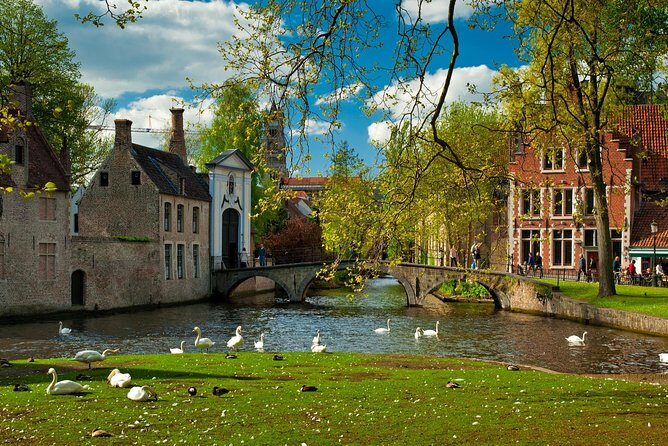 Bruges and Ghent Day Trip from Brussels - Ghent guided loop: Town Hall, Belfry dragon, and St. Bavo Cathedral