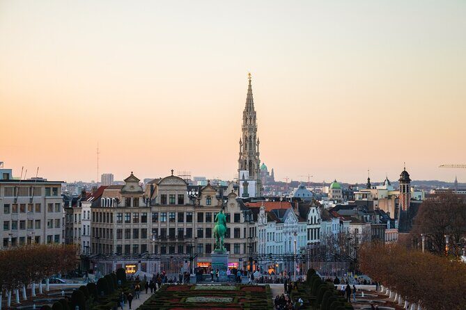 Brussels Highlights Walking and Bus Tour w/ Waffle - Royal Saint-Hubert Galleries: shopping arcade with a story