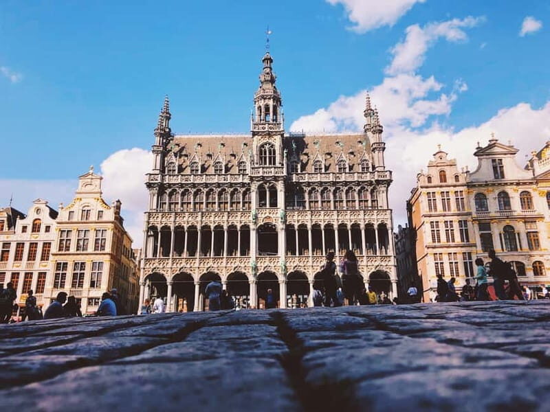 Brussels Highlights: Walking & Bus Tour with Waffle Tasting - Royal Galleries Break and Waffle Tasting: Where the Schedule Gets Delicious
