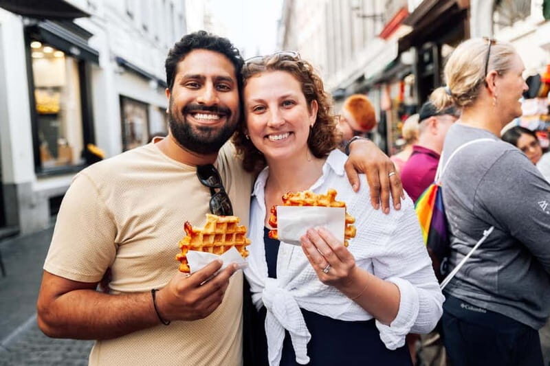 Brussels: Historical Tour with Chocolate & Waffle Tasting - Manneken Pis and the quick photo moment that actually leads somewhere