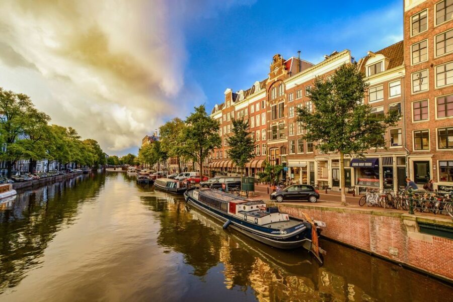 From Brussels: Cheese, Clogs & Windmills Amsterdam Day Trip - Canal cruise time: what it adds to a tight schedule