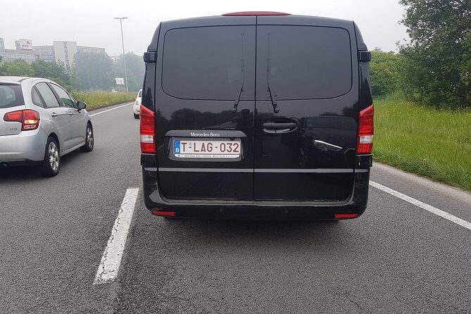 Luxury Minivan from Charleroi airport to the city of Brussels - Meeting at Leonidas Chocolate Shop in Terminal 1